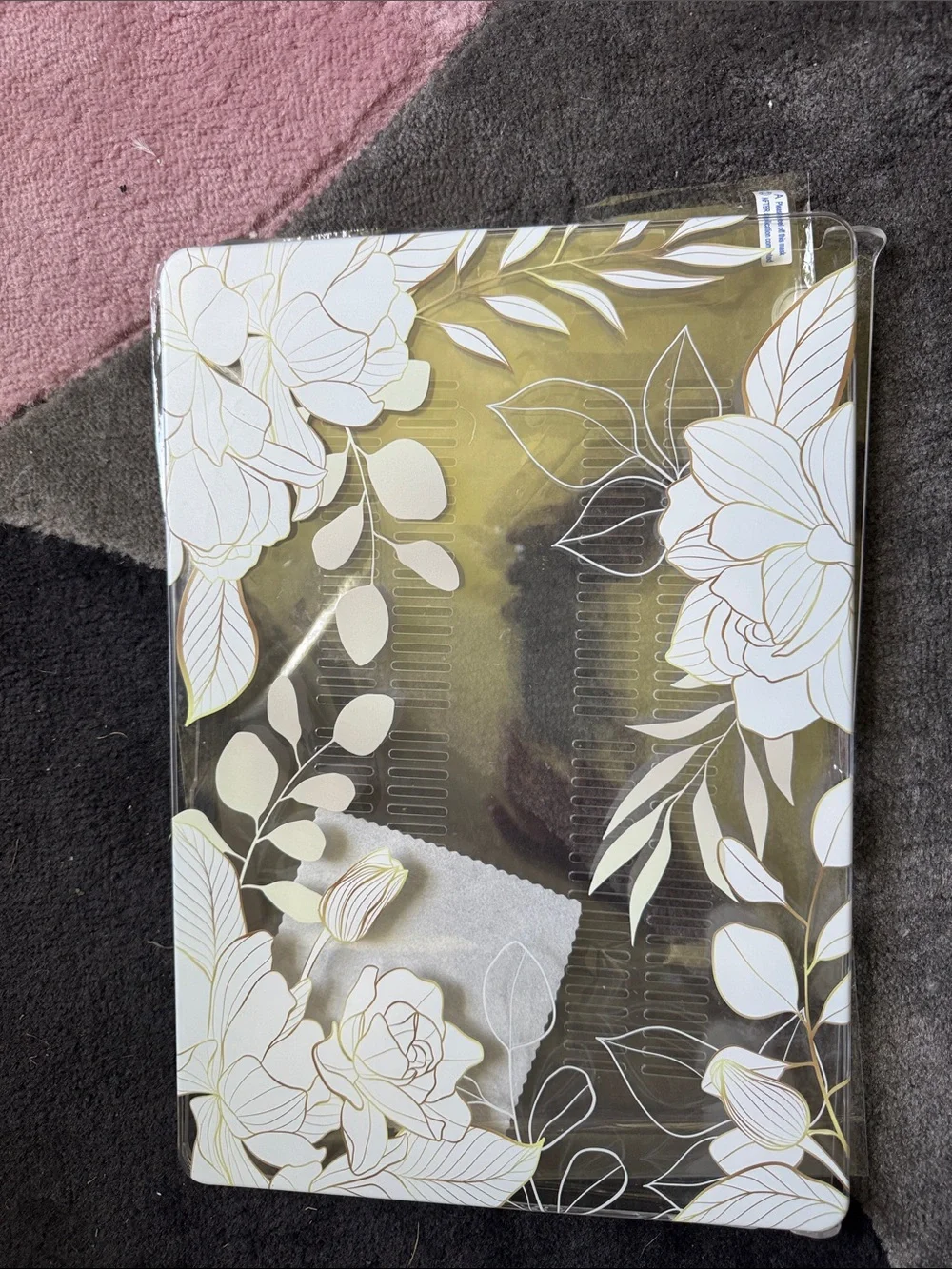 Tablet Case with White Floral Design on Gold Background